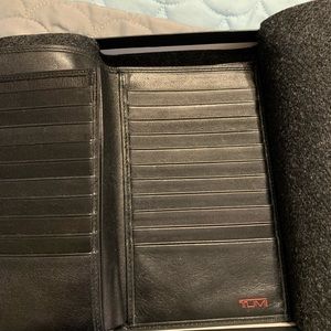 Wallet made by TUMI. Genuine leather.